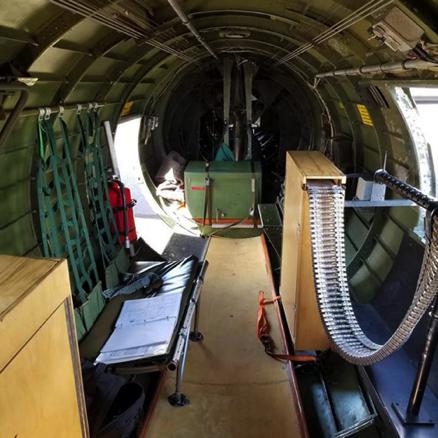 View of the “waist” section of the fuselage where two of the 13 onboard machine guns are permanently mounted in a staggered configuration that gave gunners room to move around out of each other's way.